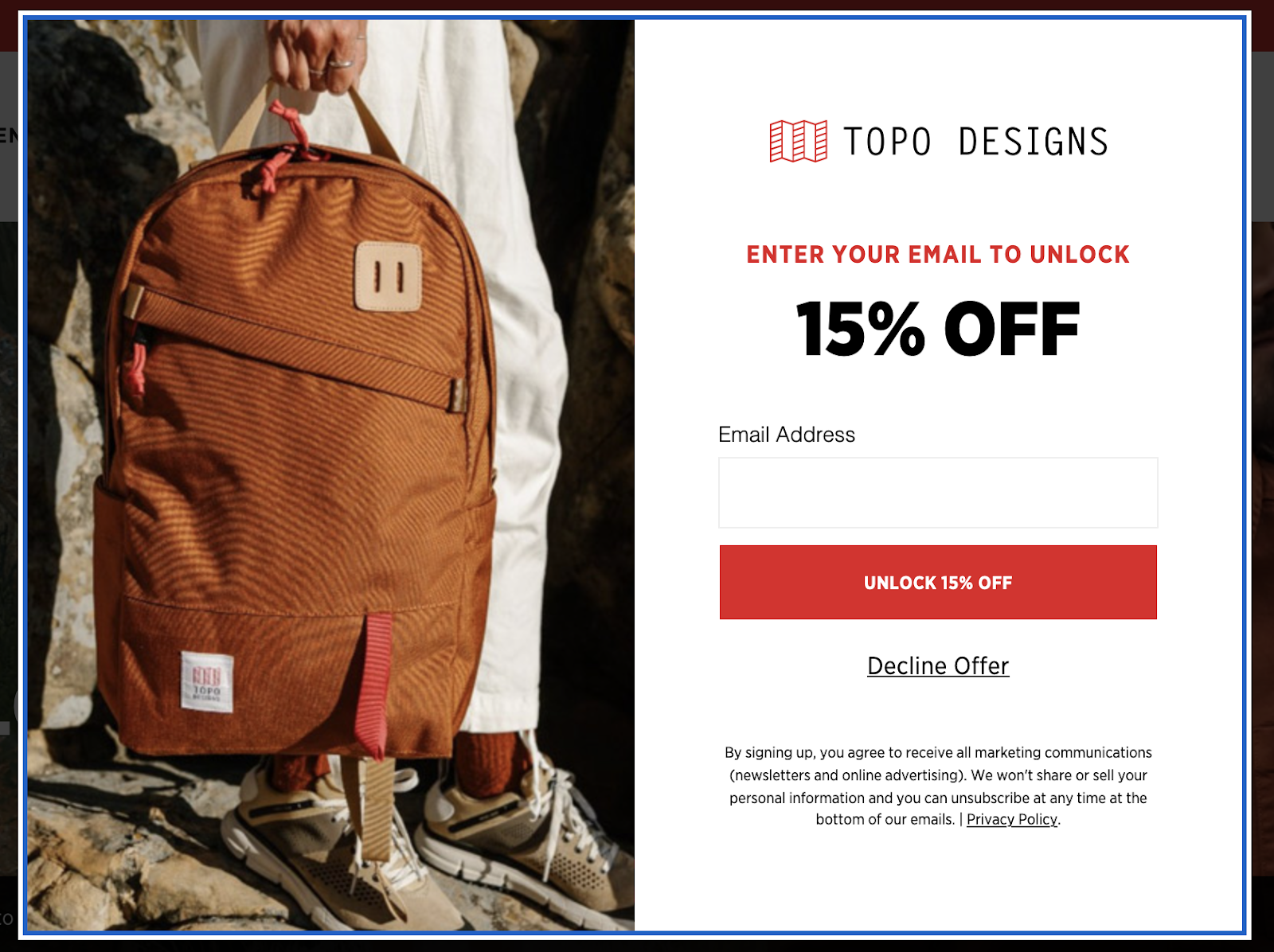 Backpack brand Topo Designs uses a bold red button to encourage shoppers to unlock 15% off.